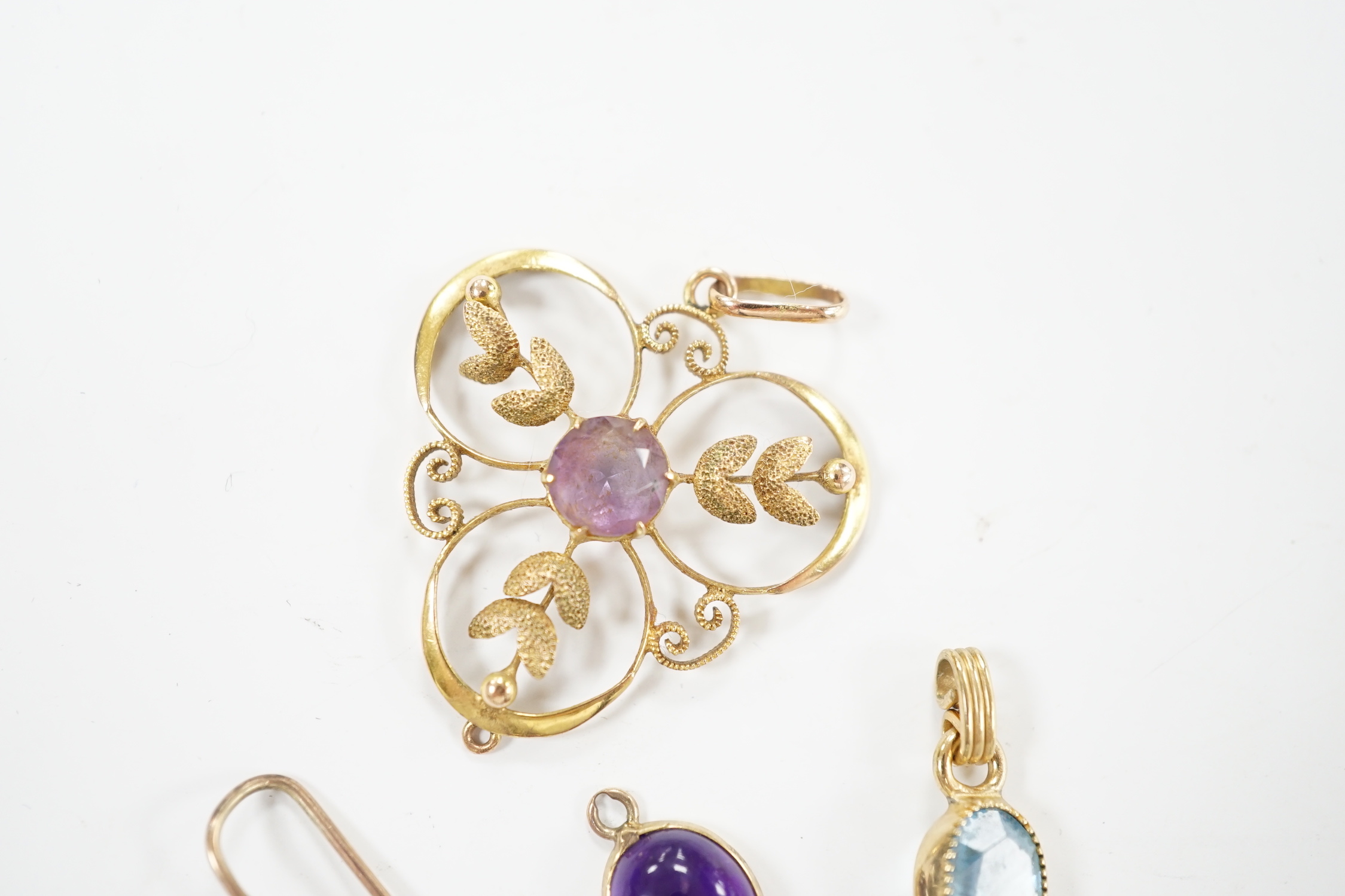 A pair of yellow metal mounted two stone cabochon amethyst set drop earrings, overall 40mm, together with two yellow metal and gem set pendants.